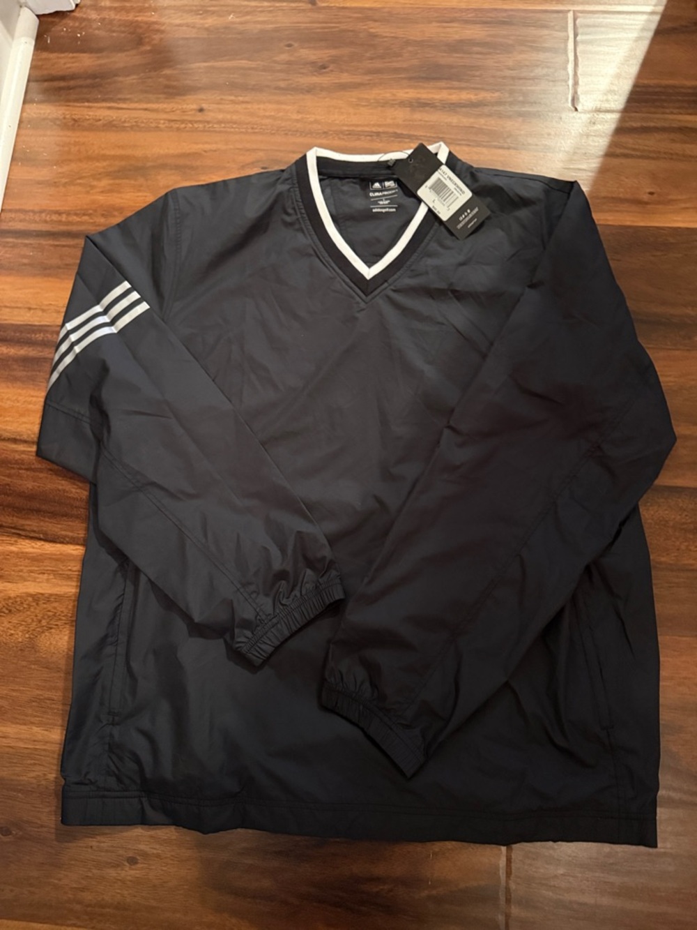 NWT Adidas V-neck Windshirt with Stripe Detail and Clima Proof.